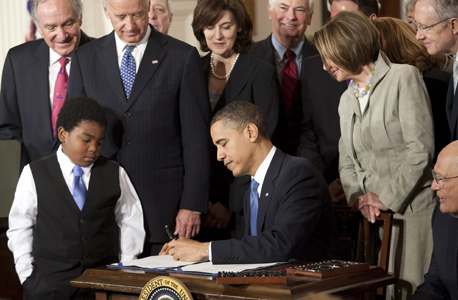 הנשיא ברק אובמה חוק הבריאות הרפורמה בבריאות, צילום: בלומברג