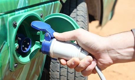 Charging an electric vehicle (illustration). Photo: Orel Cohen Charging an electric vehicle (illustration). Photo: Orel Cohen