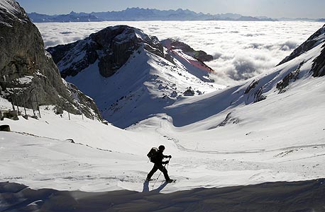 סקי באזור הר פילאטוס בשוויץ, צילום: אי פי אי