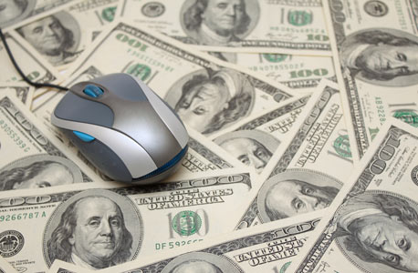 Mouse on money. Photo: Shutterstock
