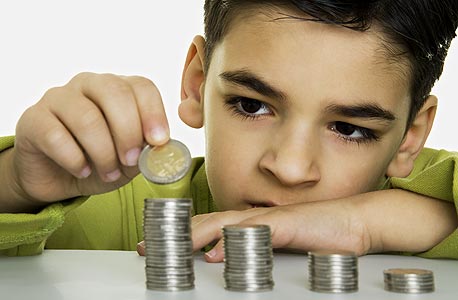 איך לחנך ילדים על חשיבות הכסף