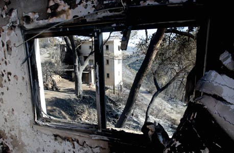 בית שנשרף בקיבוץ בית אורן, צילום: גיל נחושתן