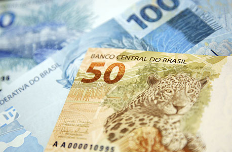 פאניקה בברזיל: המטבע נפל לשפל של כל הזמנים