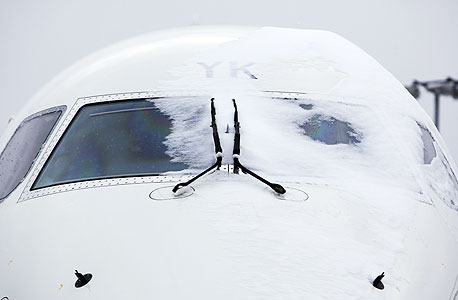 אלפי טיסות בוטלו בגלל השלג