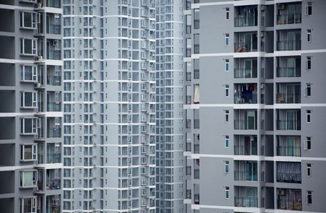 בניינים אופייניים בצ'ונגצ'ינג. כשצריך לאכלס 32 מיליון בני אדם בעיר אחת, בונים קוביות