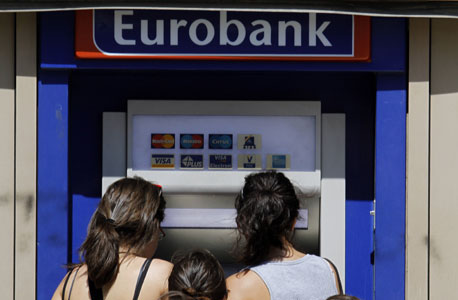 יוון: מיזוג שני הבנקים הגדולים במדינה הושהה