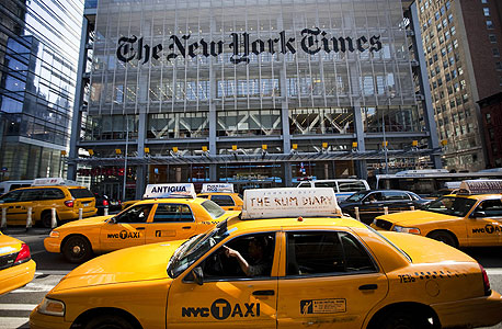 בניין הניו יורק טיימס. כ-100 כתבים, עורכים ועובדים במערכת העסקים יפוטרו