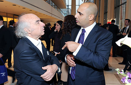 אמיר חסיד (מימין) וז'אן לוק בוטבול, בוועידת הנדל"ן של המגזין "דה ריל דיל" שנערכה במנהטן 