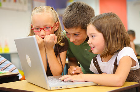 Children at a computer. Photo: Shutterstock