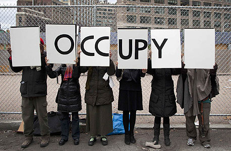 הפגנה של תנועת Occupy בוול סטריט. בניסיון לקבל עליהם מידע, עלול בית המשפט בבוסטון לפגוע במשתמשי טוויטר בעולם, צילום: רויטרס