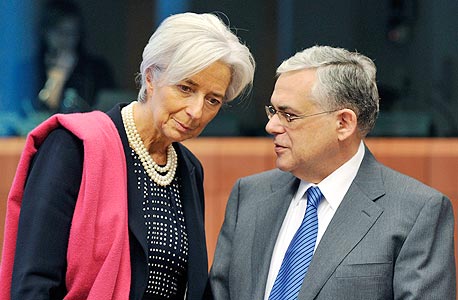 ראש קרן המטבע הבינלאומית כריסטין לגארד וראש ממשלת יוון לוקאס פפאדמוס, צילום: בלומברג