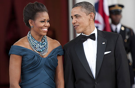 הנשיא ברק אובמה ואשתו מישל, צילום: בלומברג