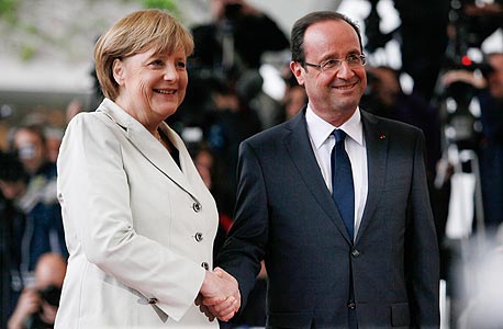 פרנסואה הולנד ואנגלה מרקל. "גרמניה חייבת להוביל"