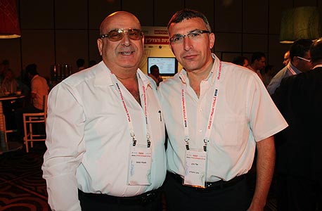 ראש מטה השיווק בבנק הפועלים אלי כהן וסובחי טנוס מקבוצת הנדל"ן STR