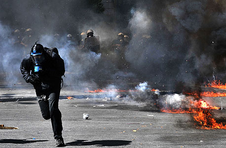 הפגנה באתונה. האם זה מה שיקרה כשמרקל תבקר?, צילום: איי אף פי