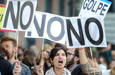 הפגנה בספרד נגד תוכניות הצנע, צילום: איי אף פי
