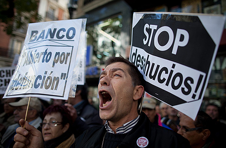הפגנה בספרד. שיעור האבטלה הגיע לשיא של 37 שנה, צילום: גטי אימג
