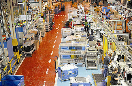 פס הייצור במפעל פאגור שבבעלות מונדרגון. ביטול הבונוס כאחריות קלקטיבית