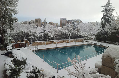 תמונות מהשלג ומהסערה: ישראל יפה בלבן 