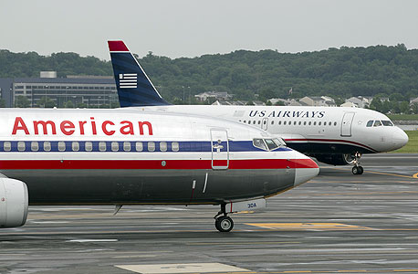 אמריקן איירליינס US Airlines יו.אס איירליינס יו.אס. איירליינס תעופה מיזוג, צילום: בלומברג