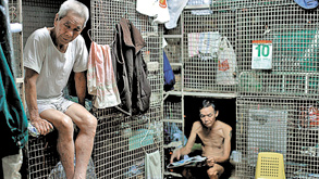 בתי כלובים בהונג קונג, צילום: אי פי איי