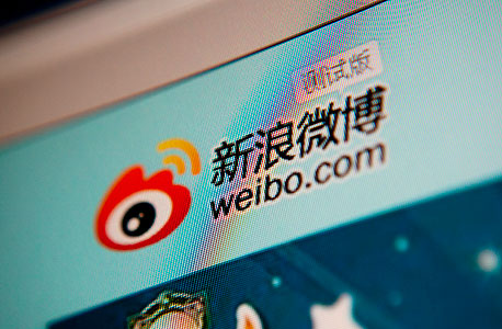סינה וייבו, הרשת החברתית הפופולרית בסין, צילום: בלומברג