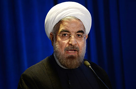 נשיא איראן, חסן רוחאני. צפוי לדון עם קרי בקווים המנחים להסכם הגרעין הסופי, צילום: איי אף פי