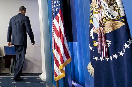 הנשיא אובמה בבית הלבן, צילום: איי אף פי