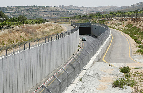גדר ההפרדה בירושלים. המדינה הבטיחה ליזמים ב־2011 כי "שר האוצר ירכוש את זכות החזקה והשימוש בקרקע"