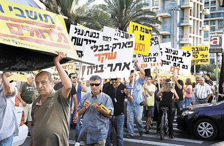הפגנה שערכו תושבי גבעת עמל ביולי 2013 נגד הכוונה לפנותם