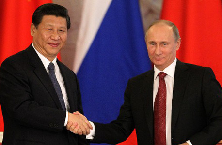 ולדימיר פוטין ונשיא סין שי ג'ינפינג, צילום: אי פי איי