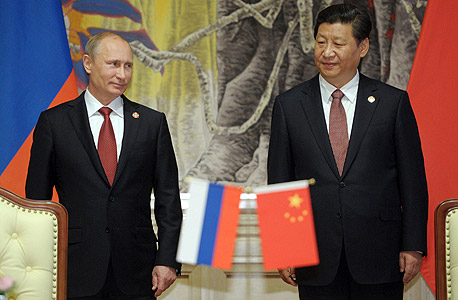 נשיא רוסיה ולדימיר פוטין ונשיא סין שי ג