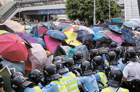 דיווח: סין מפיצה נוזקה שמרגלת אחרי סמארטפוני המפגינים בהונג קונג