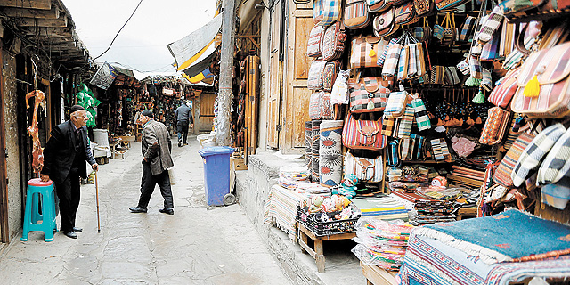 שוק בכפר מסולה בצפון איראן. זרביבי: "כשהלכתי לבית הספר, צילום: אי פי איי