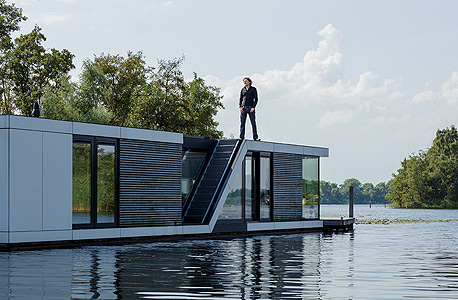אלטהיוס, על אחד הבתים הצפים שתכנן בהולנד. "עליית מפלס הים תאתגר חלק גדול מהעולם, לא רק איים קטנים"