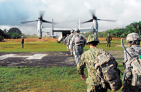 חיילים אמריקאים בליבריה, השנה. עלייה של 1% בתלוש חיילים אמריקאים בליבריה, השנה. עלייה של 1% בתלוש