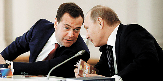 מימין: נשיא רוסיה פוטין וראש הממשלה הרוסי מדבדב, צילום: רויטרס