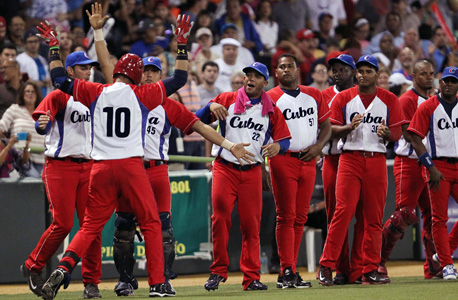 שחקני נבחרת הבייסבול של קובה. לא בטוח שהממשל בקובה מבסוט מהגעה של ה-MLB, צילום: איי פי