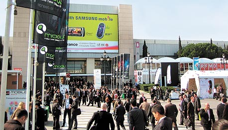 הכניסה לאולם תערוכת GSMA בברצלונה. המיתון מורגש בקושי הכניסה לאולם תערוכת GSMA בברצלונה. המיתון מורגש בקושי