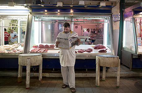 קצב בשוק של אתונה ממתין לקונים , צילום: אייפי