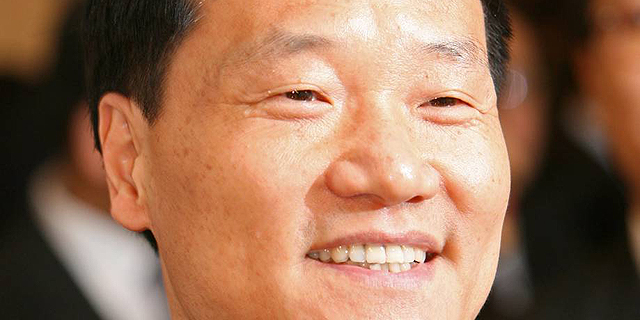 שיאו גאנג, יו"ר ועדת הרגולציה על ני"ע, צילום: בלומברג