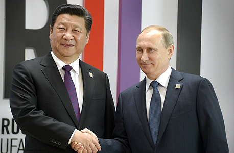 מימין ולדימיר פוטין נשיא רוסיה ו נשיא סין שי ג'ינפינג , צילום: איי אף פי