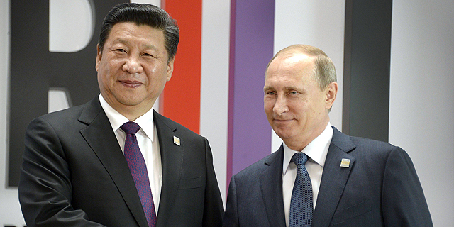 מימין ולדימיר פוטין נשיא רוסיה ונשיא סין שי ג