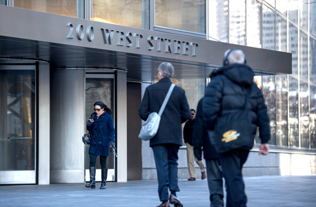 מטה גולדמן זאקס בניו יורק. מעורבים בחלק גדול מעסקאות הענק, צילום: בלומברג