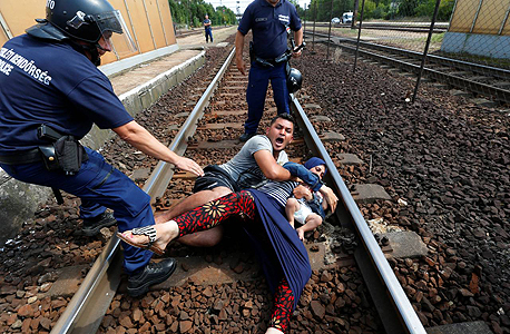 פליטים בבודפשט, צילום: רויטרס