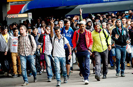 אירופה מוצפת מהגרים. האם זו הזדמנות כלכלית?, צילום: אם סי טי
