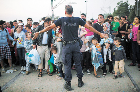 פליטים סורים ביוון, צילום: איי פי