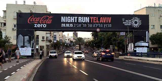 מירוץ הלילה של תל אביב: לרוץ עם תפאורת רחוב זוהרת