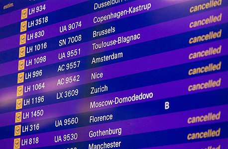לוח טיסות מבוטלות, נמל התעופה פרנקפורט, צילום: בלומברג