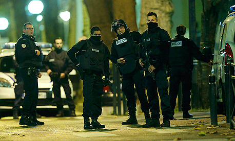 חילופי אש בניסיון ללכוד את מתכנן הפיגועים בפריז, צילום: רויטרס